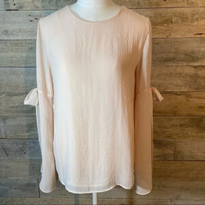 Reitman’s women’s  blush coloured romantic‎ blouse in size x-small